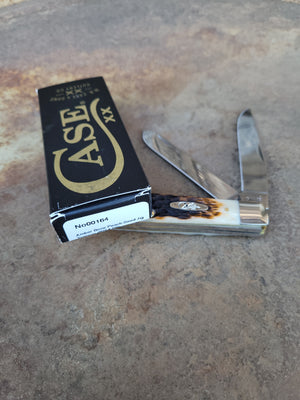 Case Knife - 00164 Amber Bone Peach Seed Jig Trapper